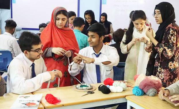 Deaf students conducting a science experiment